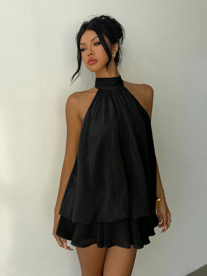 Chiffon ruffled mini dress with tiered ruffles, neck tie, and open back – Seychelles