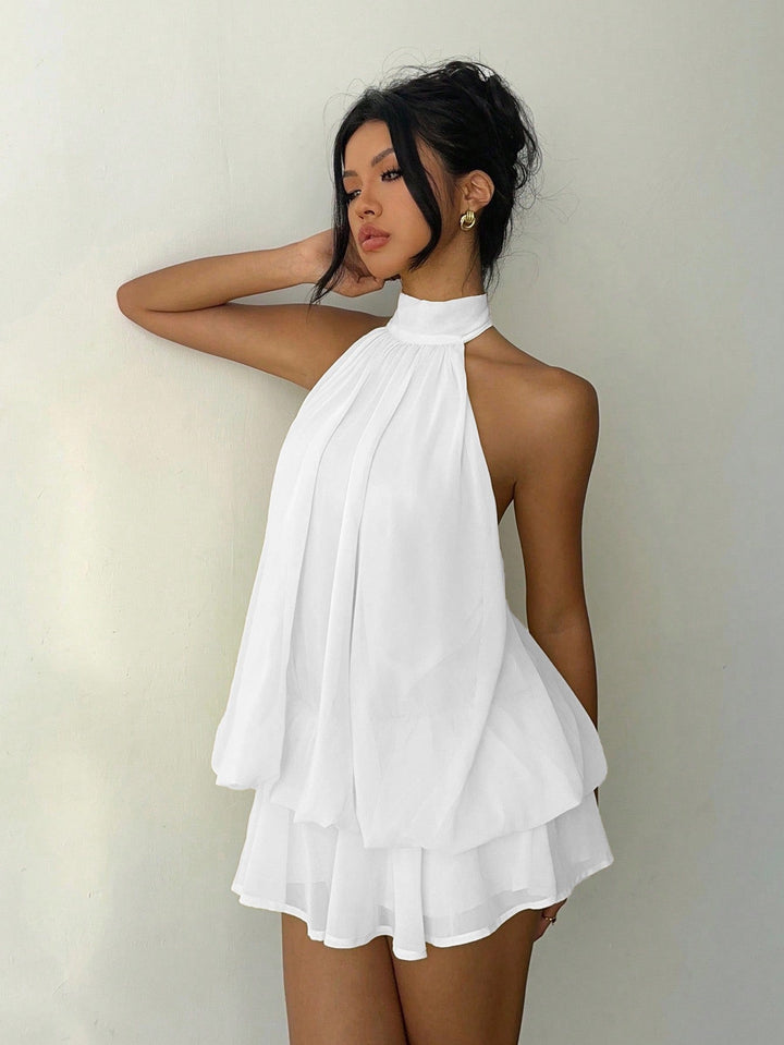 Chiffon ruffled mini dress with tiered ruffles, neck tie, and open back – Seychelles