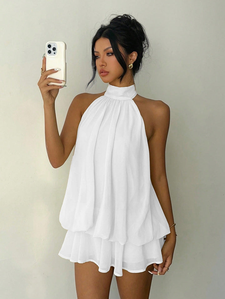 Chiffon ruffled mini dress with tiered ruffles, neck tie, and open back – Seychelles