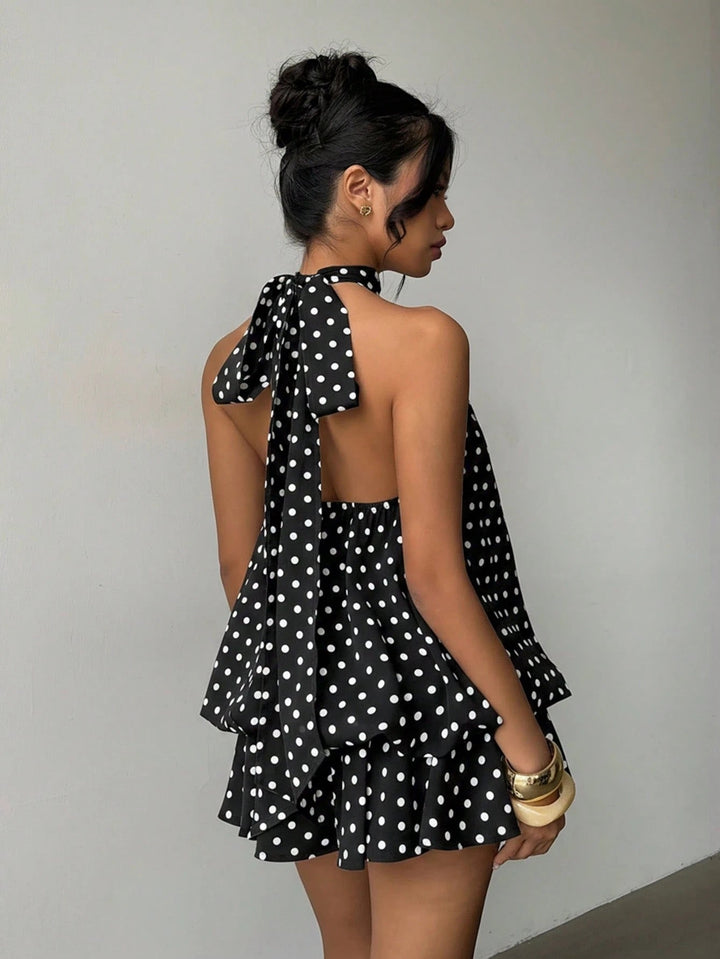 Chiffon ruffled mini dress with tiered ruffles, neck tie, and open back – Seychelles