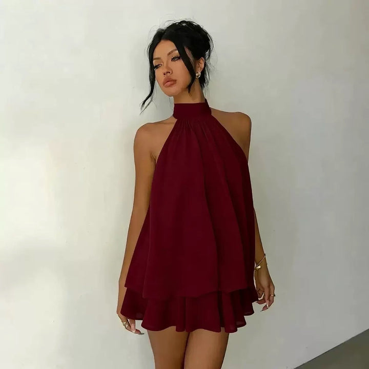 Chiffon ruffled mini dress with tiered ruffles, neck tie, and open back – Seychelles