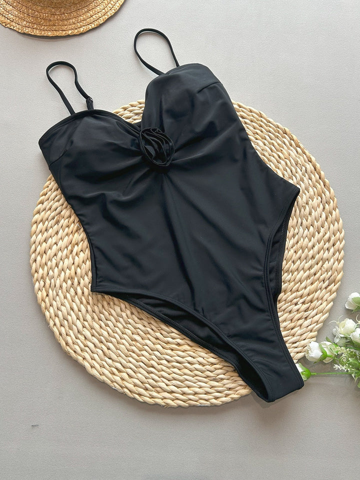 High-waisted one-piece swimsuit with polka-dot design – Bella