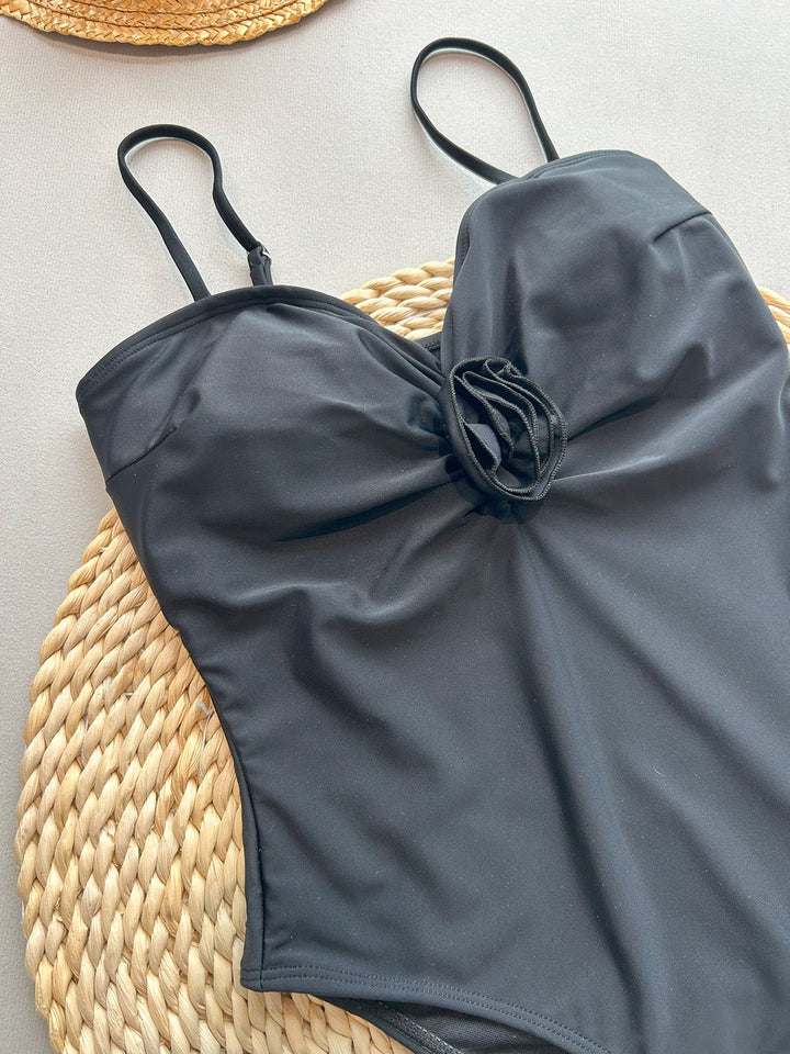 High-waisted one-piece swimsuit with polka-dot design – Bella