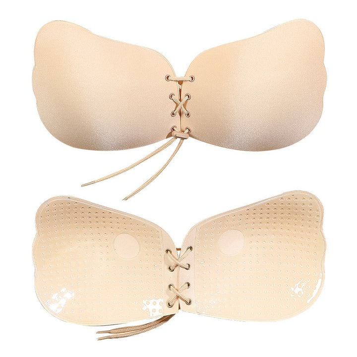 Adhesive strapless bra for securing the breasts
