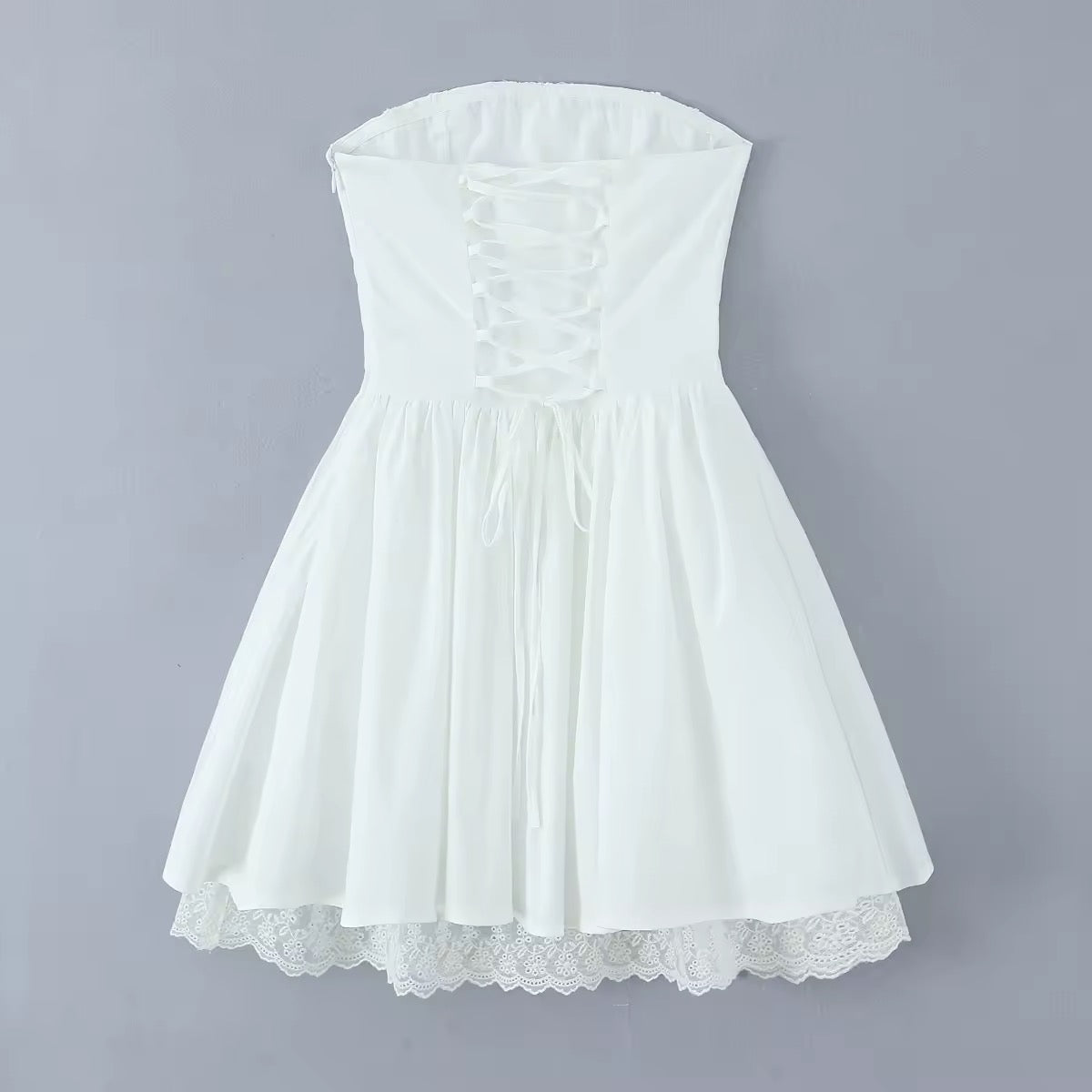 שמלת מיני בגזרת A קשירה בגב להצמדה במותן סטייל כפרי - Reya