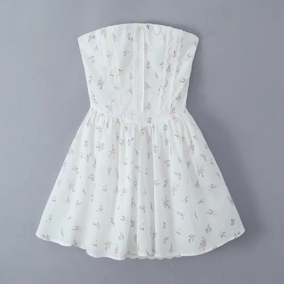 שמלת מיני בגזרת A קשירה בגב להצמדה במותן סטייל כפרי - Reya