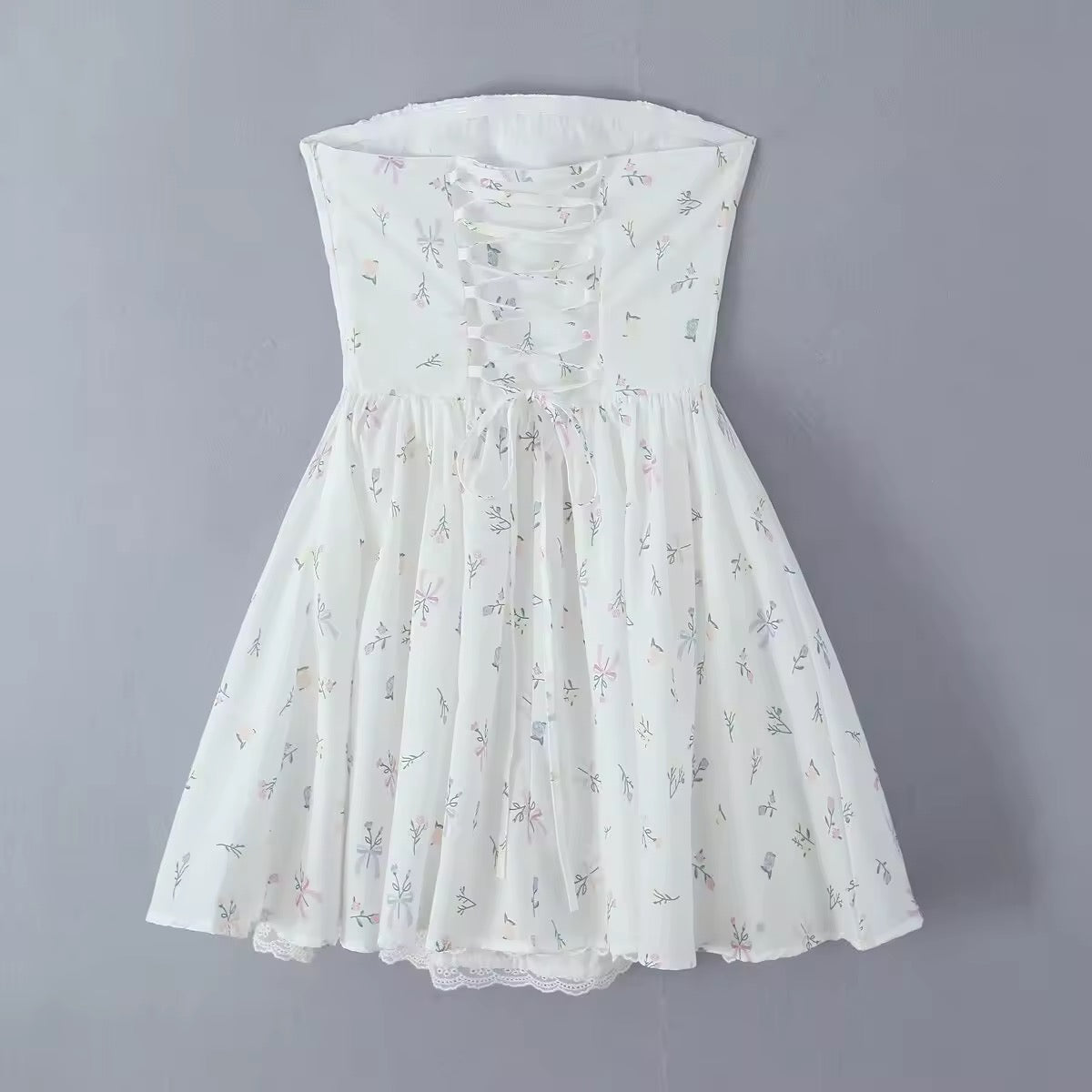 שמלת מיני בגזרת A קשירה בגב להצמדה במותן סטייל כפרי - Reya