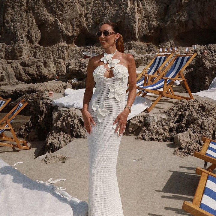 Natalia knitted beach maxi dress with a floral design and open back