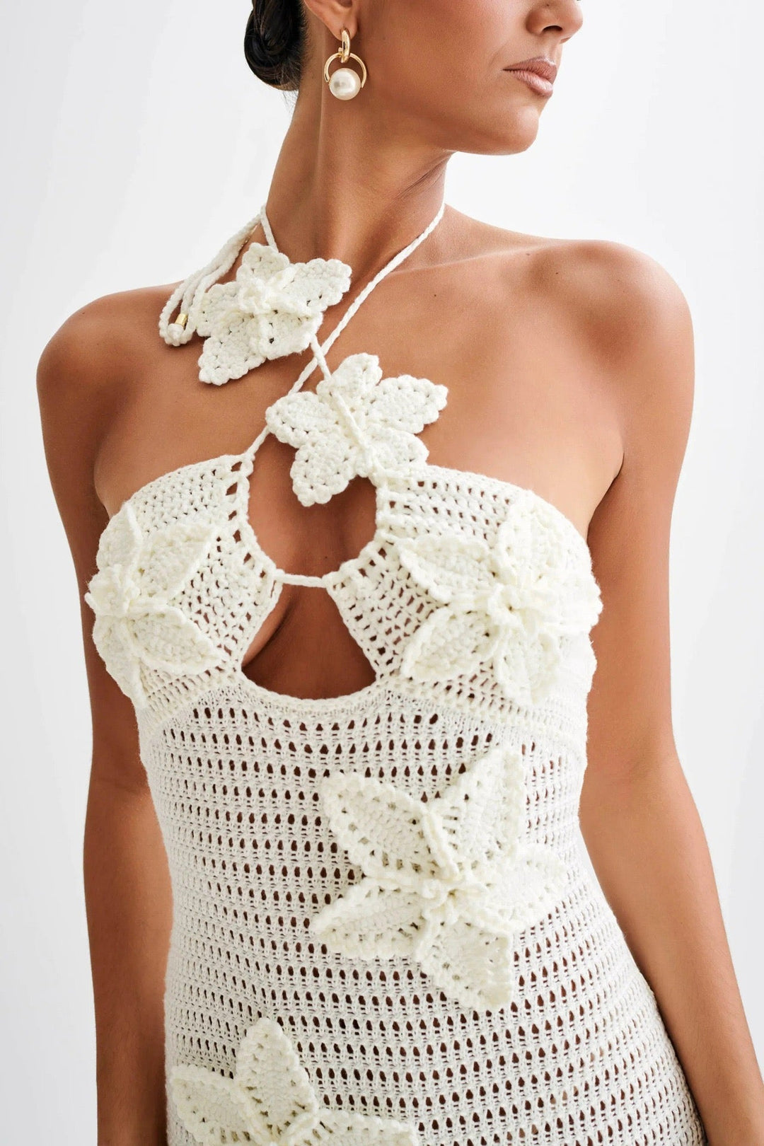 Natalia knitted beach maxi dress with a floral design and open back