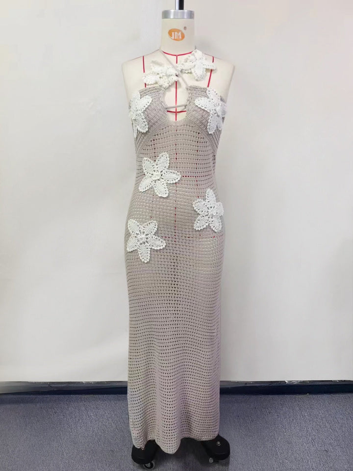 Natalia knitted beach maxi dress with a floral design and open back
