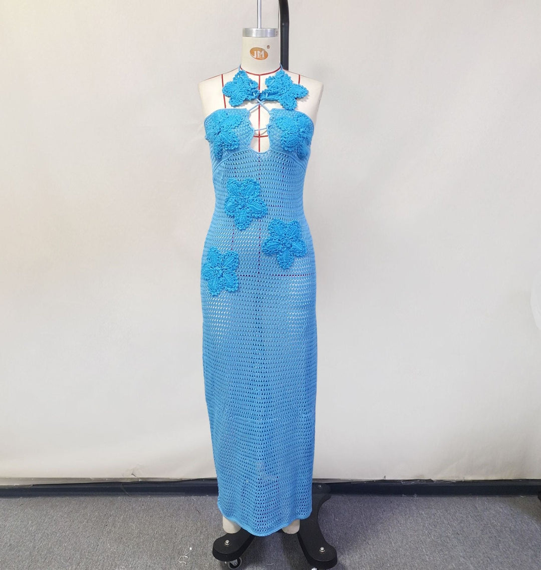 Natalia knitted beach maxi dress with a floral design and open back