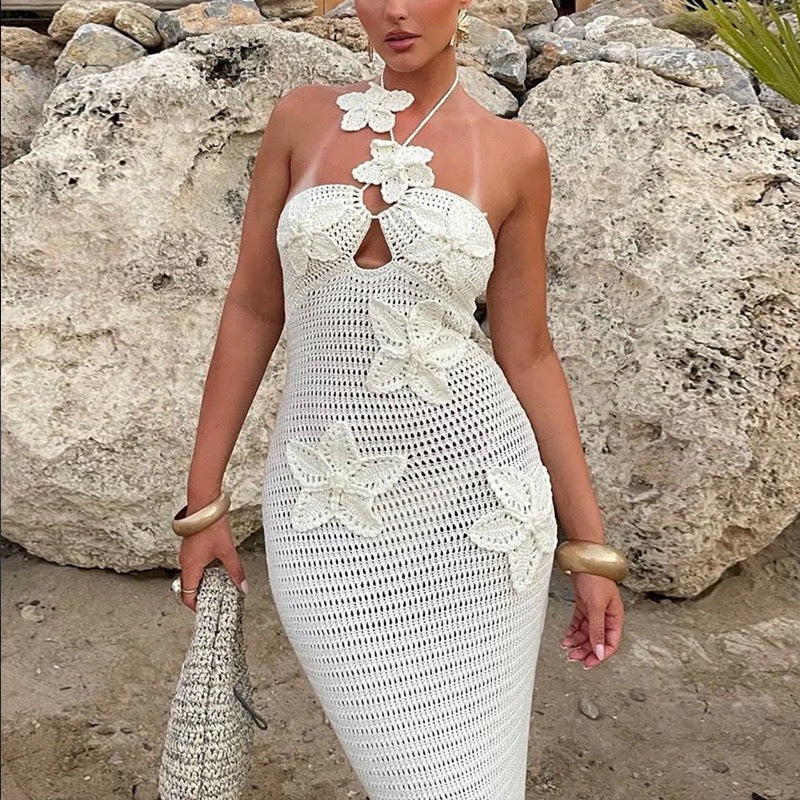 Natalia knitted beach maxi dress with a floral design and open back