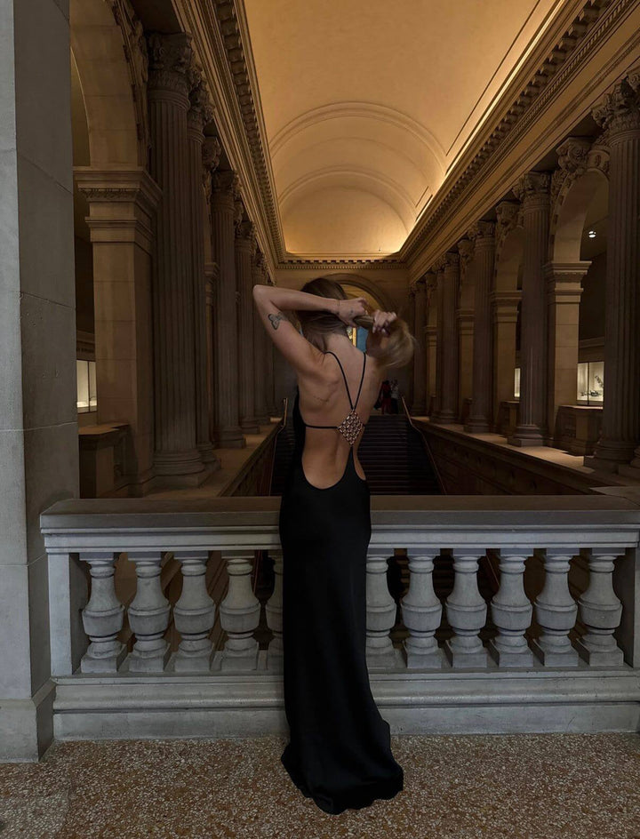 Roxania elegant satin maxi dress with a diamond buckle detail on the back