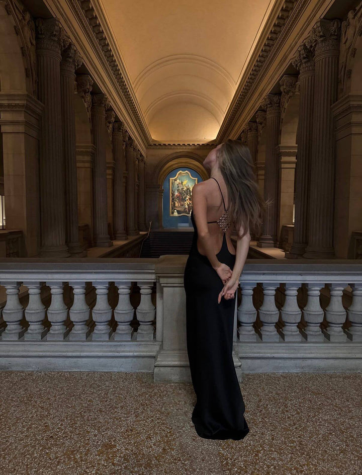 Roxania elegant satin maxi dress with a diamond buckle detail on the back