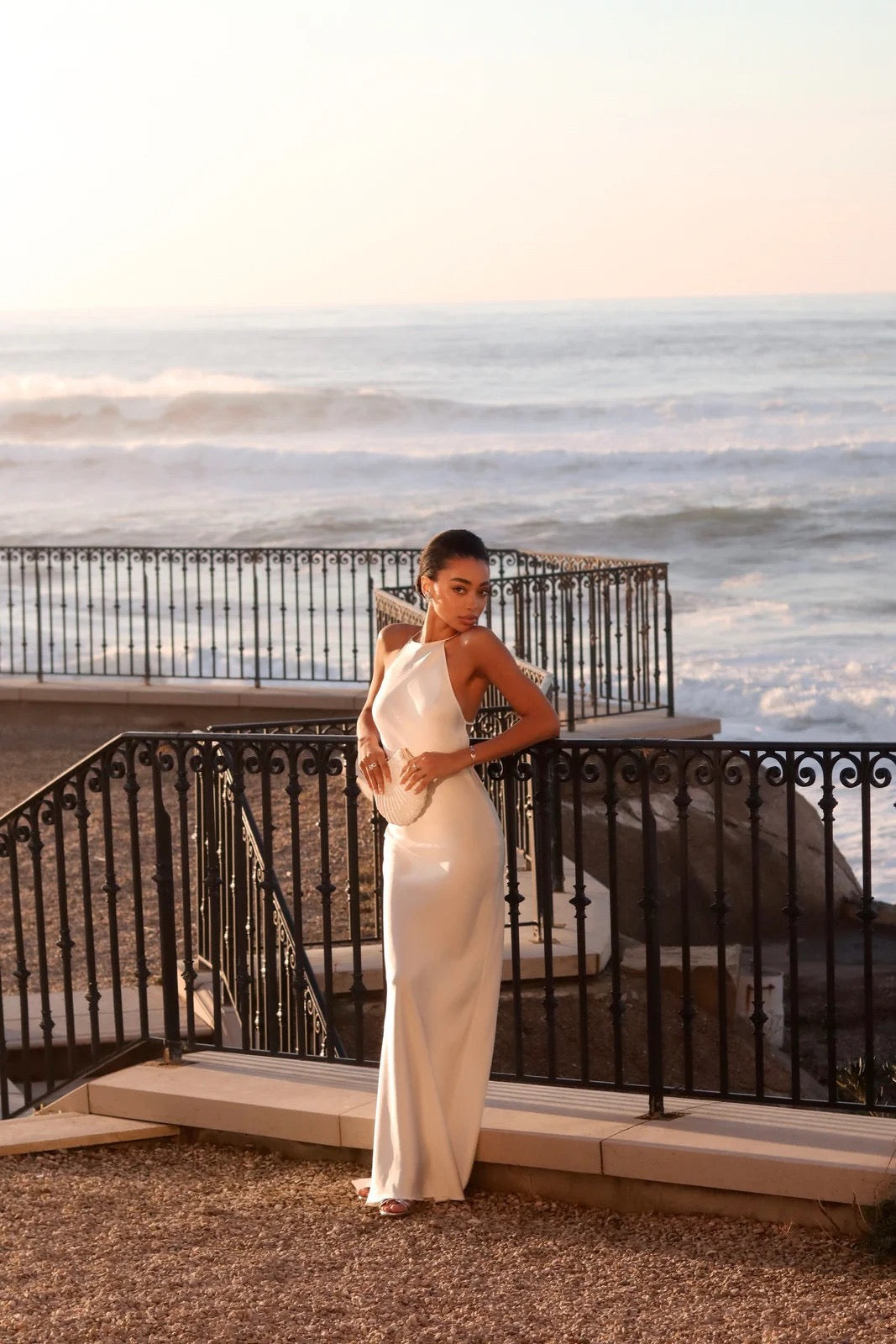 Roxania elegant satin maxi dress with a diamond buckle detail on the back