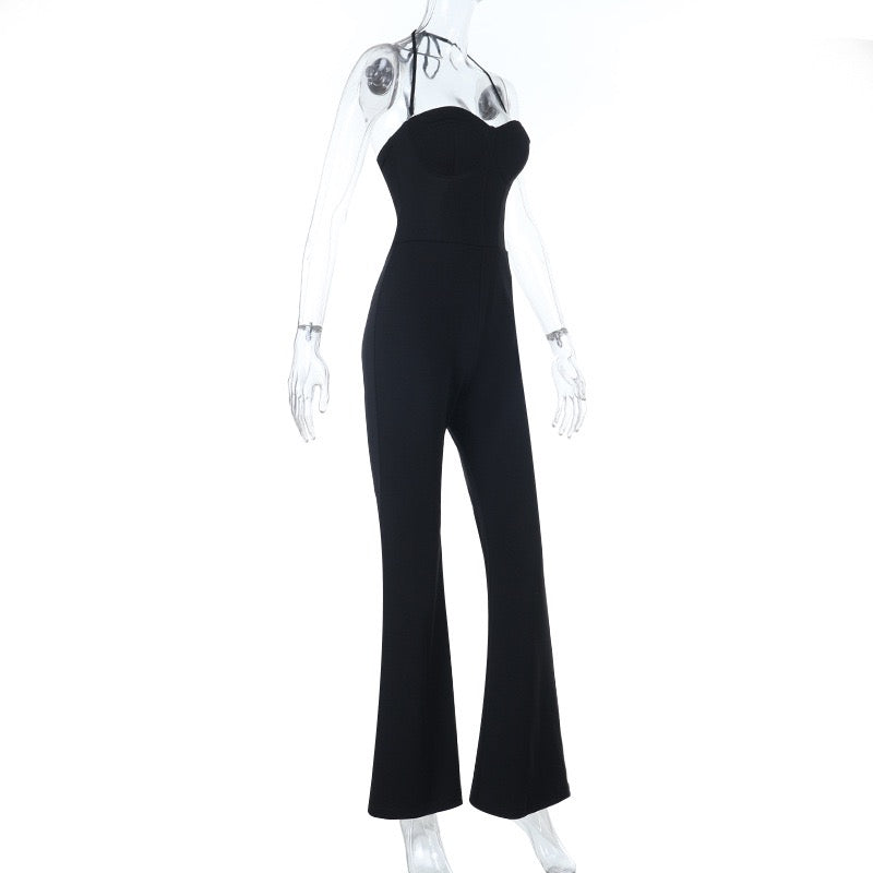 Mik long jumpsuit in shaping fabric with an open back, back tie, and waist-cinching fit