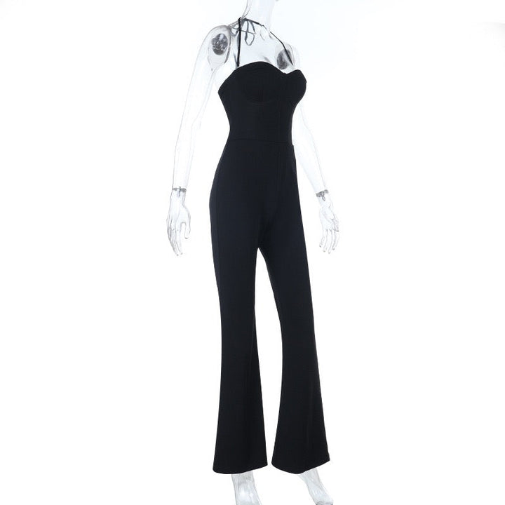 Mik long jumpsuit in shaping fabric with an open back, back tie, and waist-cinching fit