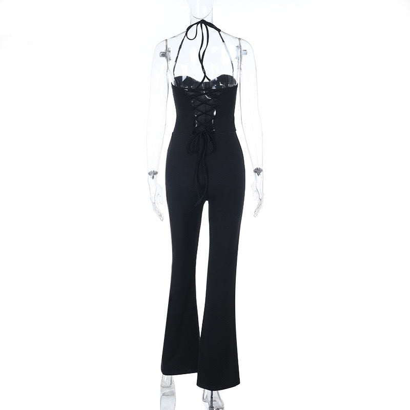 Mik long jumpsuit in shaping fabric with an open back, back tie, and waist-cinching fit