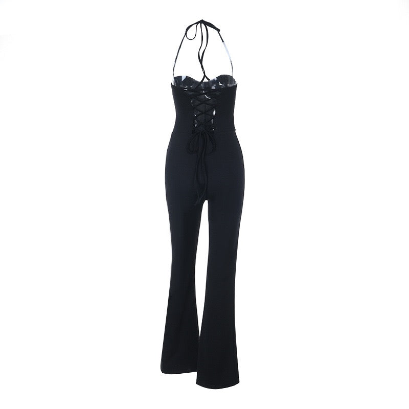 Mik long jumpsuit in shaping fabric with an open back, back tie, and waist-cinching fit