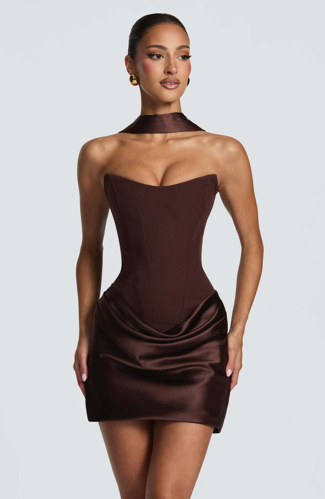 GENNA strapless satin mini dress with pleats, a tie-up corset at the back for a fitted waist, and a scarf detail