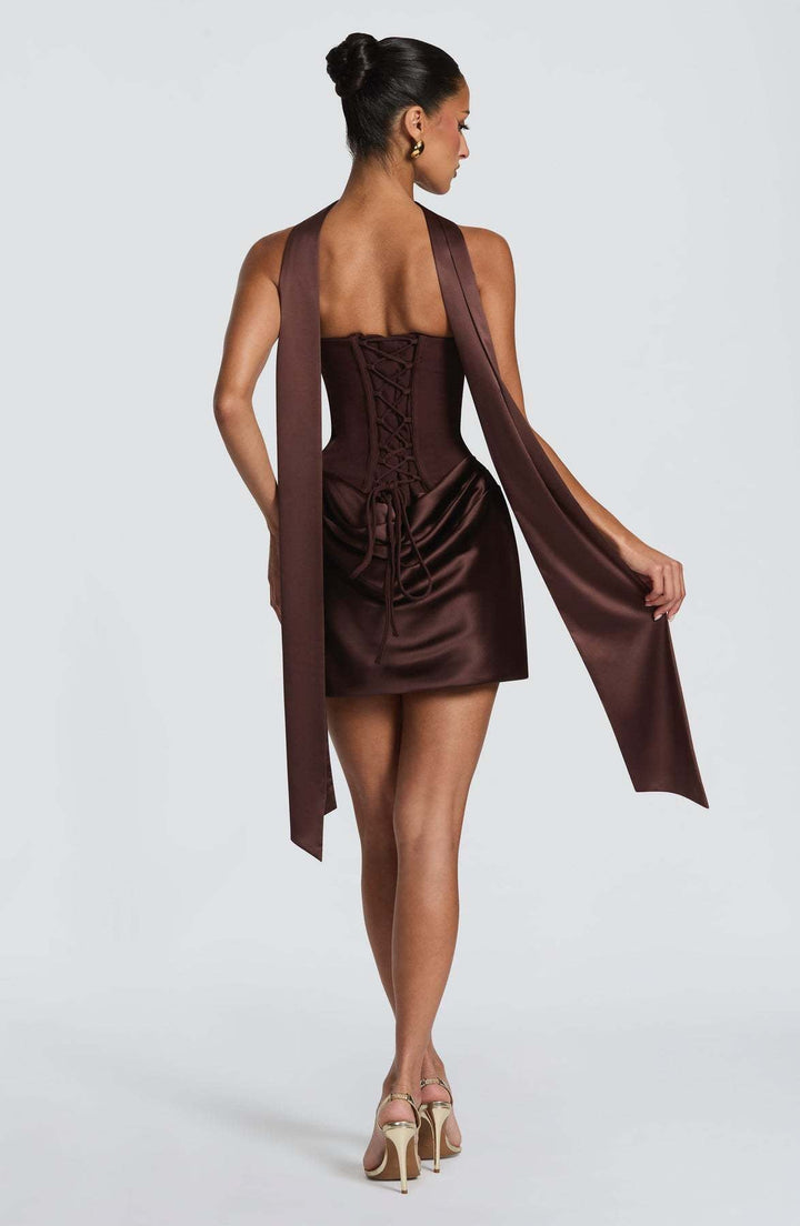 GENNA strapless satin mini dress with pleats, a tie-up corset at the back for a fitted waist, and a scarf detail