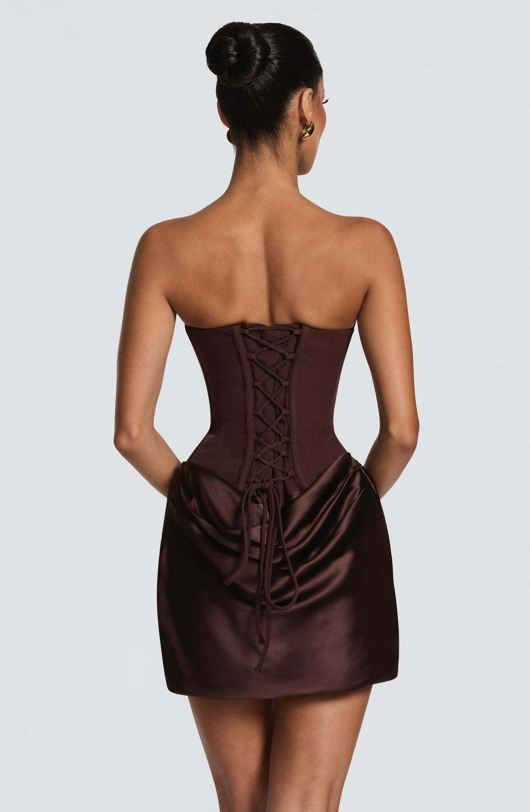 GENNA strapless satin mini dress with pleats, a tie-up corset at the back for a fitted waist, and a scarf detail