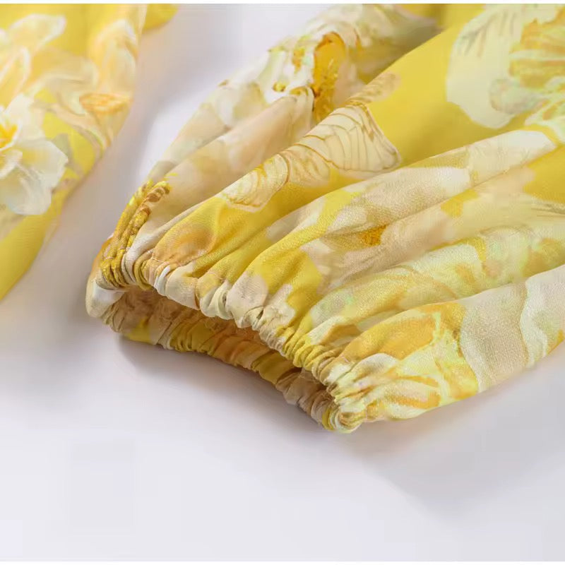 שמלת מיני פרחונית מלמלה בעיצוב מדורג - MIEL