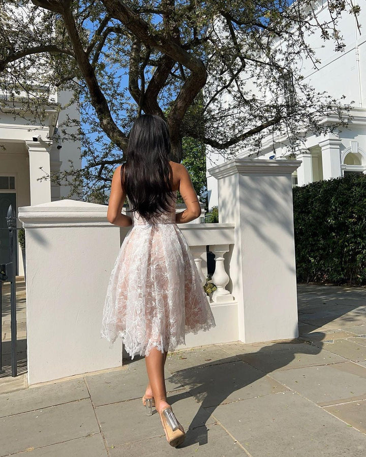 Rosalie strapless midi dress with a shiny floral embroidery design
