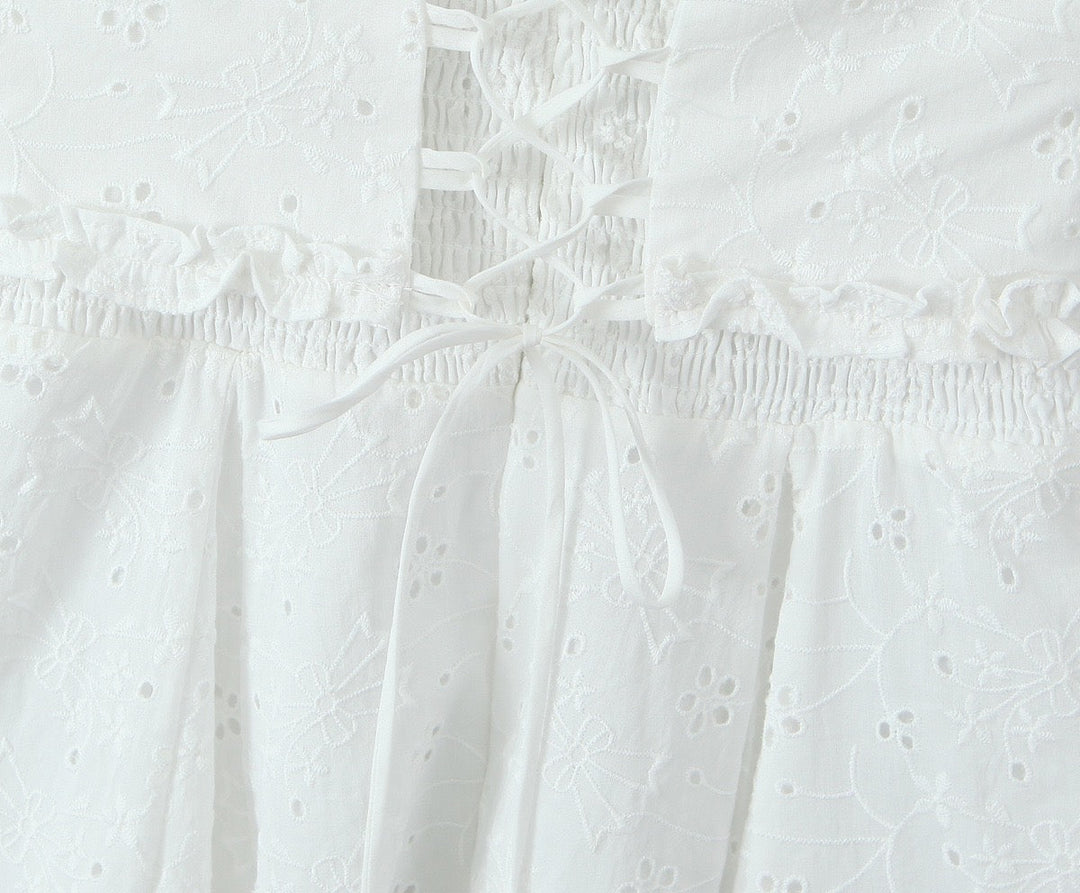 A-line mini dress in embroidered eyelet fabric with back ties for a fitted waist – Vנס