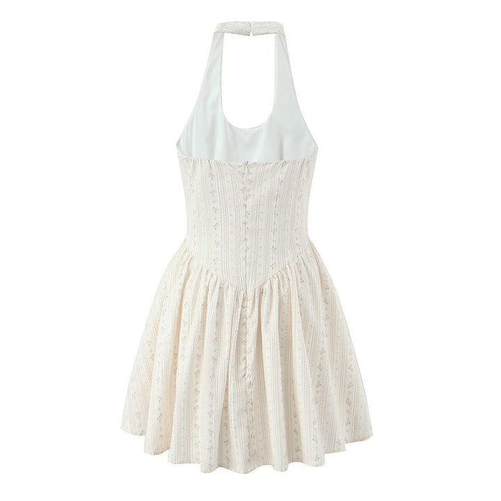 Floral A-line mini dress with an open back – Nelly