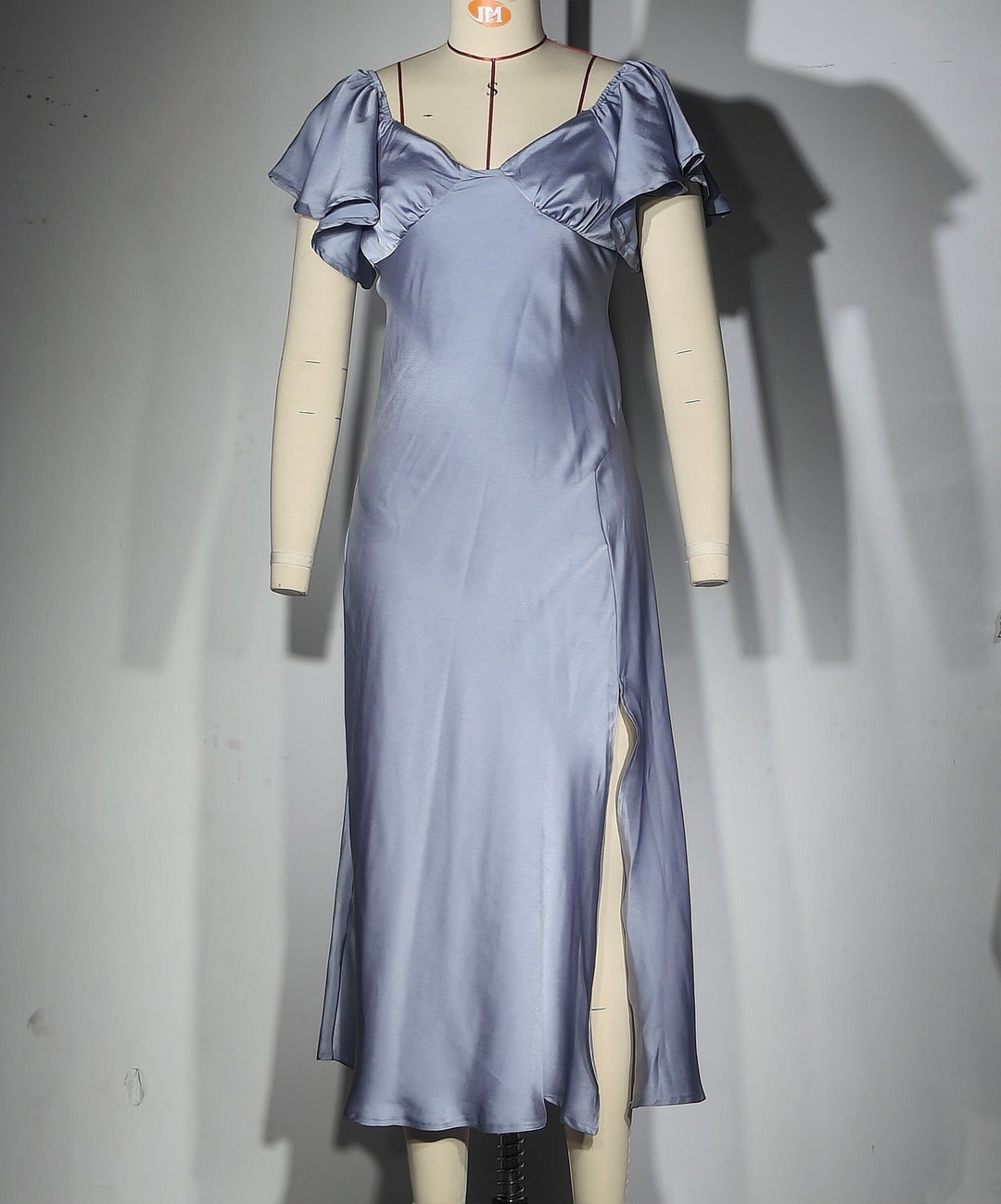 Koren satin midi dress with an off-the-shoulder design
