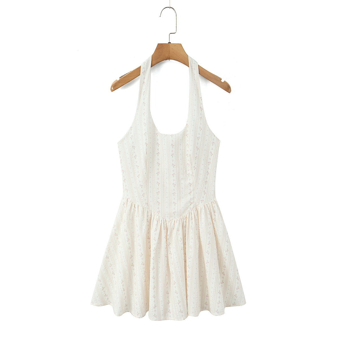Floral A-line mini dress with an open back – Nelly
