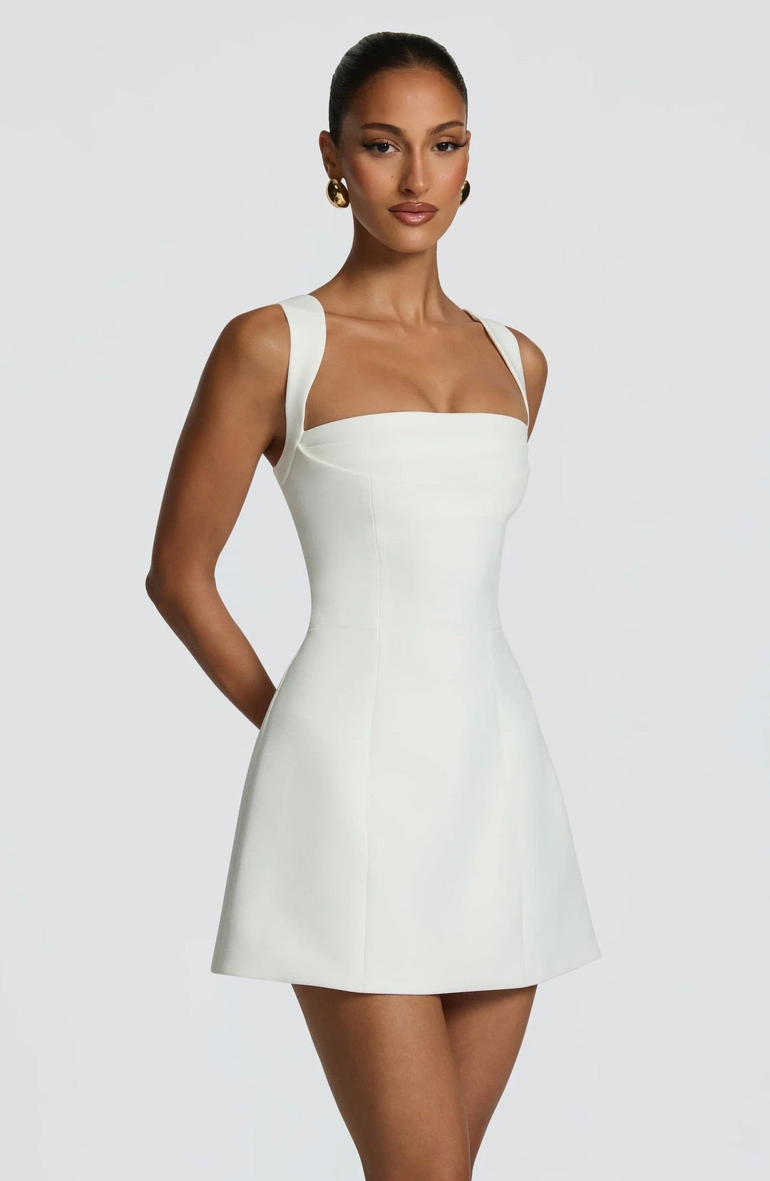 A-line mini dress with back ties for a fitted waist – Vela