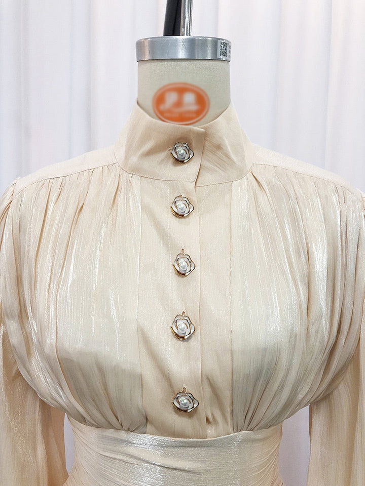 Luciela ruched chiffon ruffle mini dress with a shiny fabric and button trim