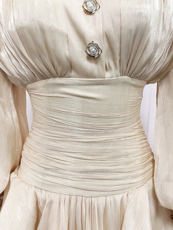 Luciela ruched chiffon ruffle mini dress with a shiny fabric and button trim