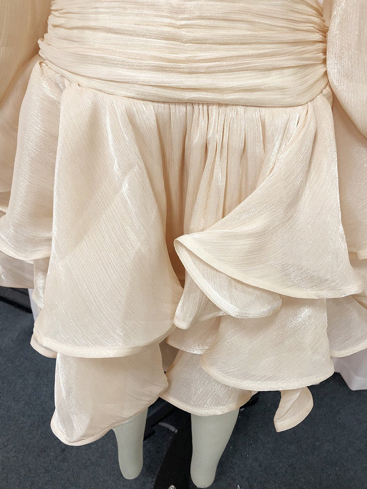 Luciela ruched chiffon ruffle mini dress with a shiny fabric and button trim