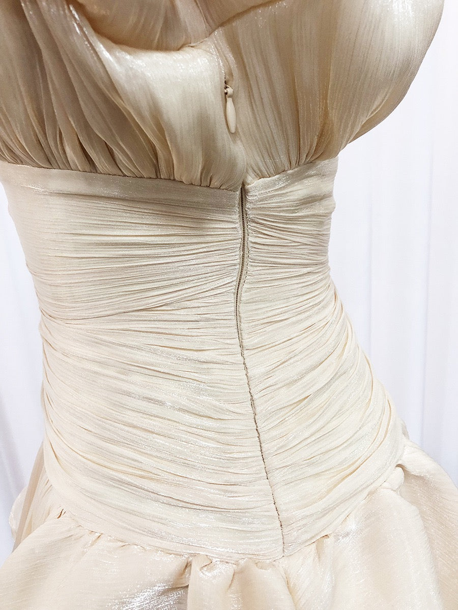 Luciela ruched chiffon ruffle mini dress with a shiny fabric and button trim