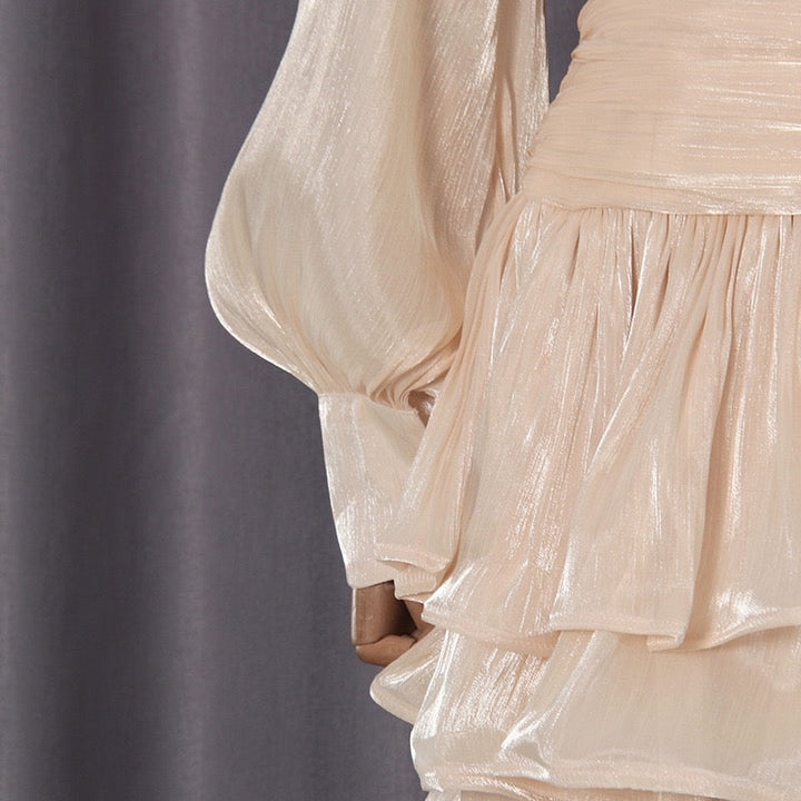 Luciela ruched chiffon ruffle mini dress with a shiny fabric and button trim