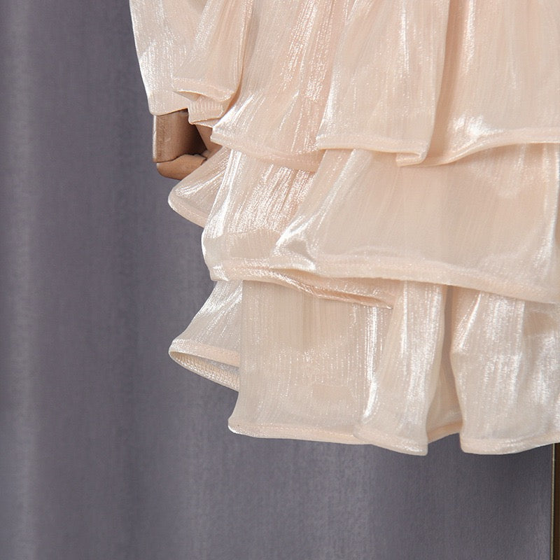Luciela ruched chiffon ruffle mini dress with a shiny fabric and button trim