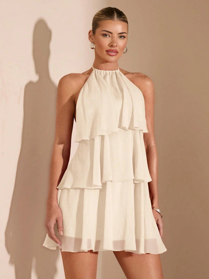 Milly tiered chiffon ruffle mini dress with a neck tie and open back