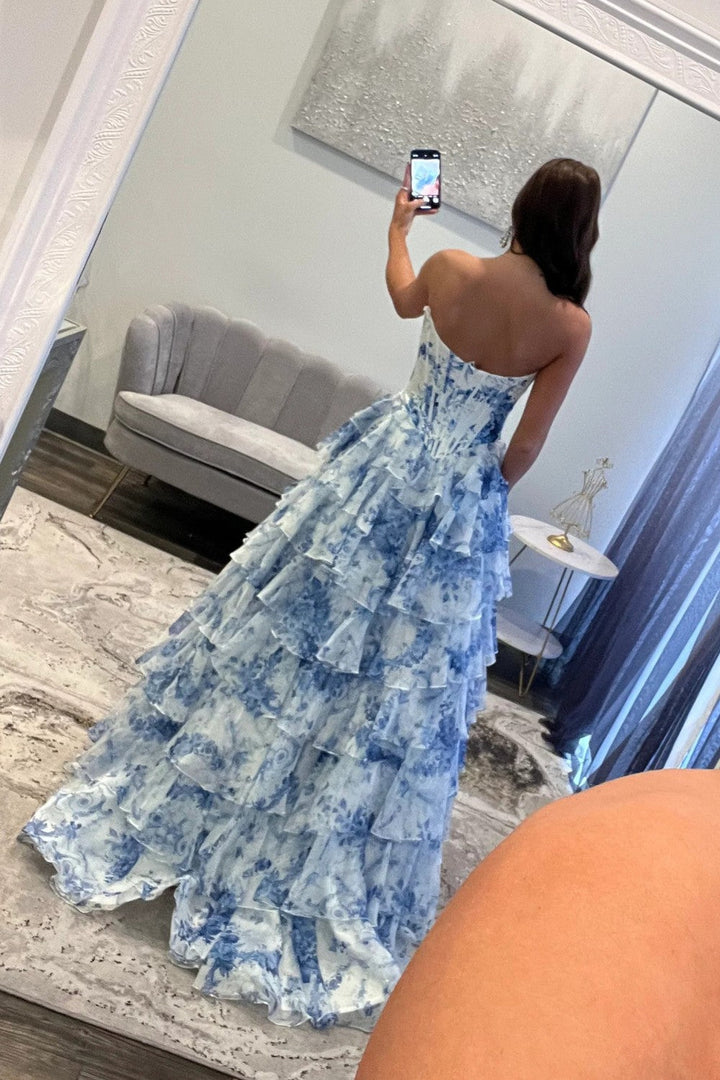 SHERY strapless ruffle maxi dress with a corset design, back tie, waist-cinching fit, and slit