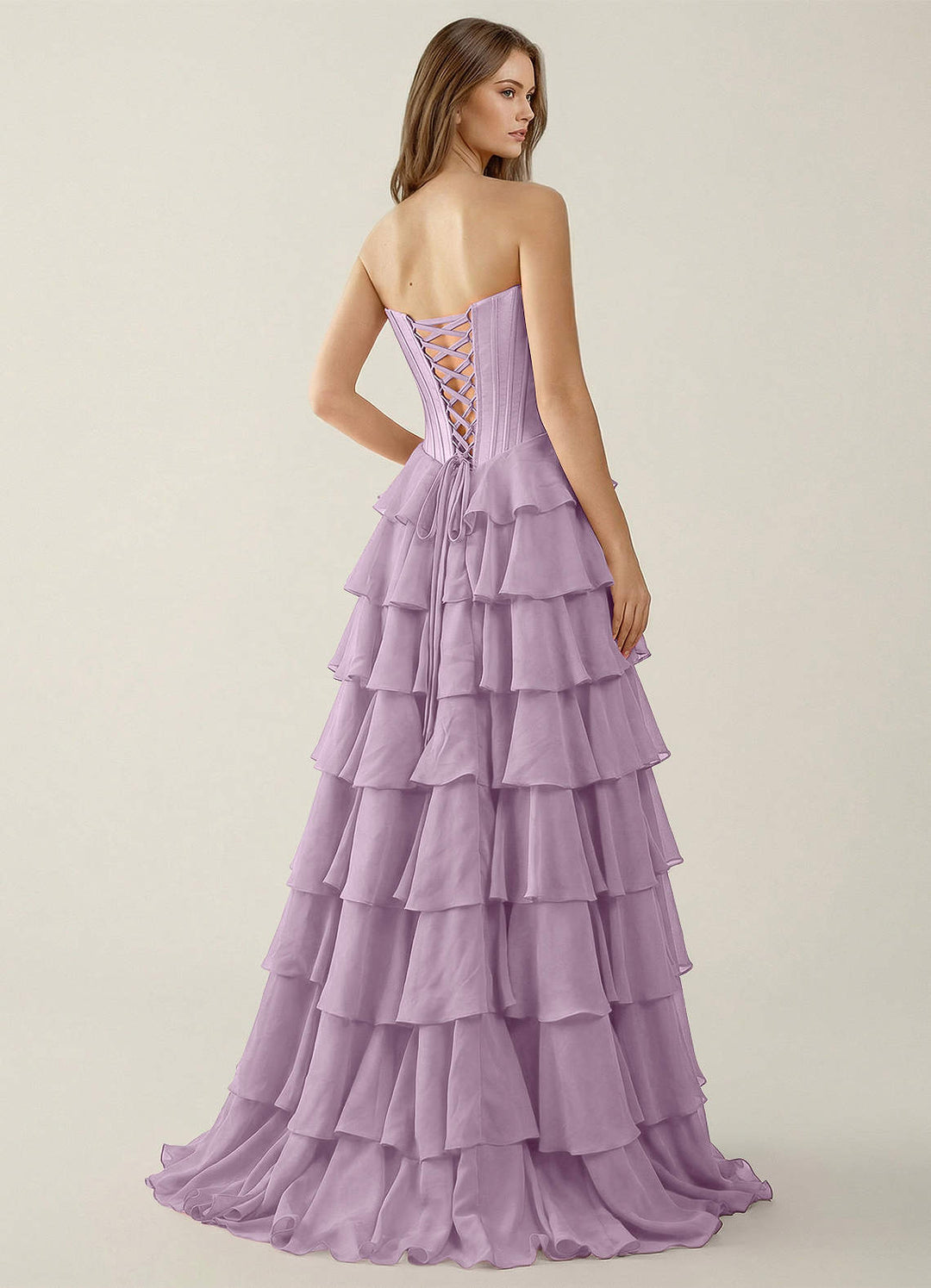 SHERY strapless ruffle maxi dress with a corset design, back tie, waist-cinching fit, and slit