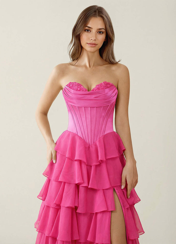 SHERY strapless ruffle maxi dress with a corset design, back tie, waist-cinching fit, and slit