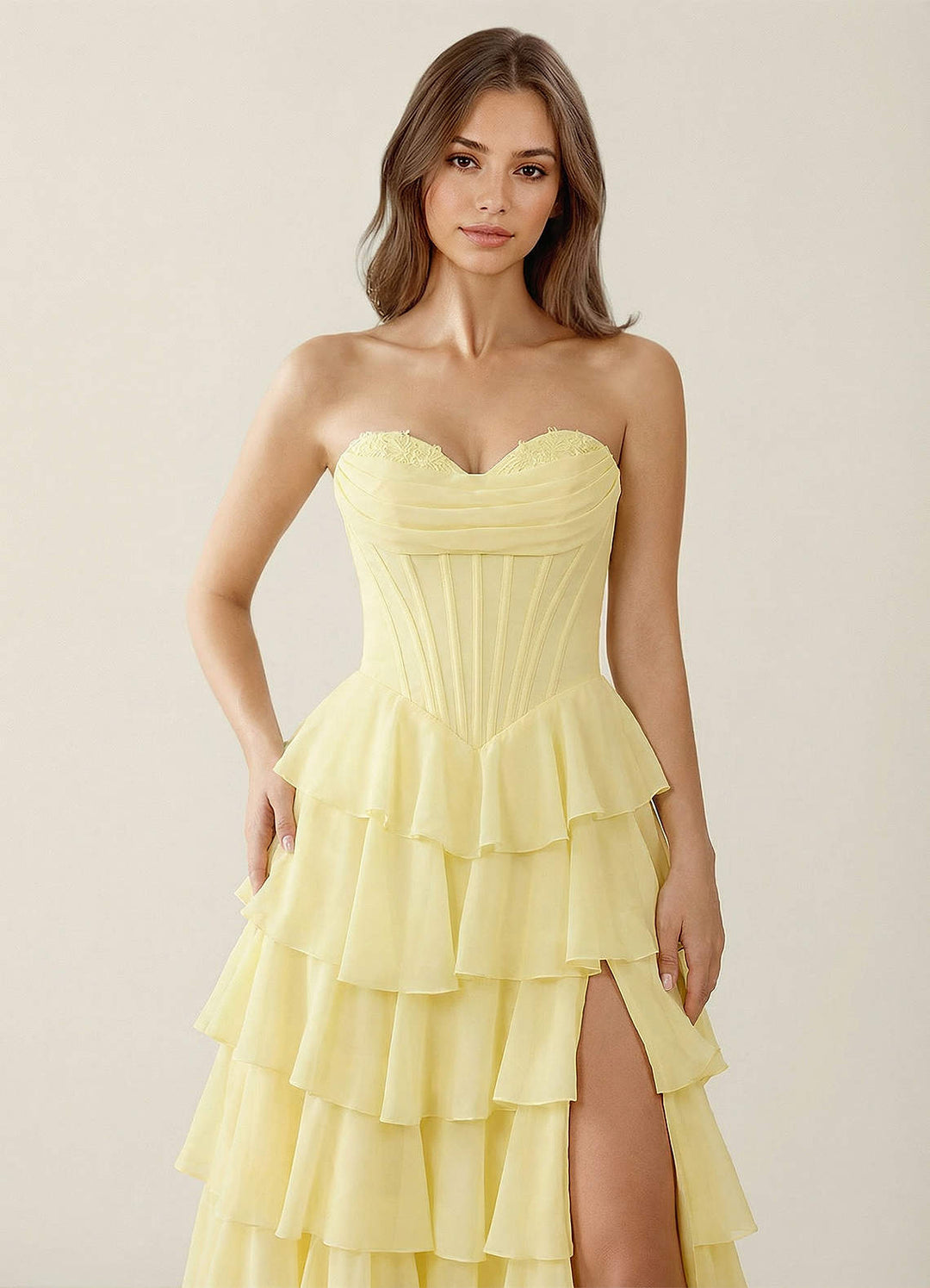 SHERY strapless ruffle maxi dress with a corset design, back tie, waist-cinching fit, and slit