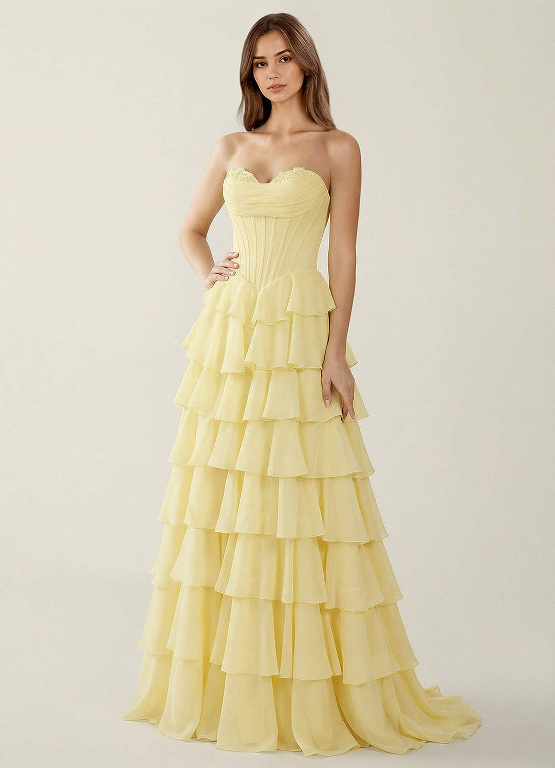 SHERY strapless ruffle maxi dress with a corset design, back tie, waist-cinching fit, and slit