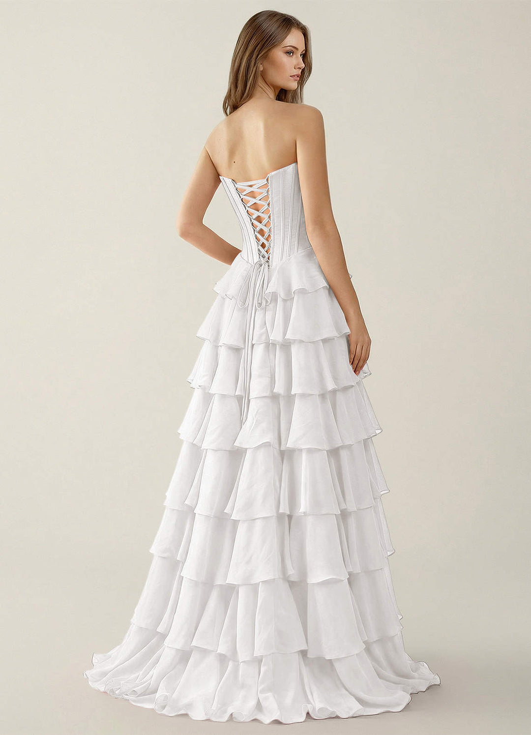 SHERY strapless ruffle maxi dress with a corset design, back tie, waist-cinching fit, and slit
