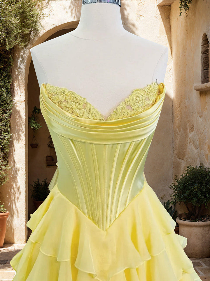 SHERY strapless ruffle maxi dress with a corset design, back tie, waist-cinching fit, and slit