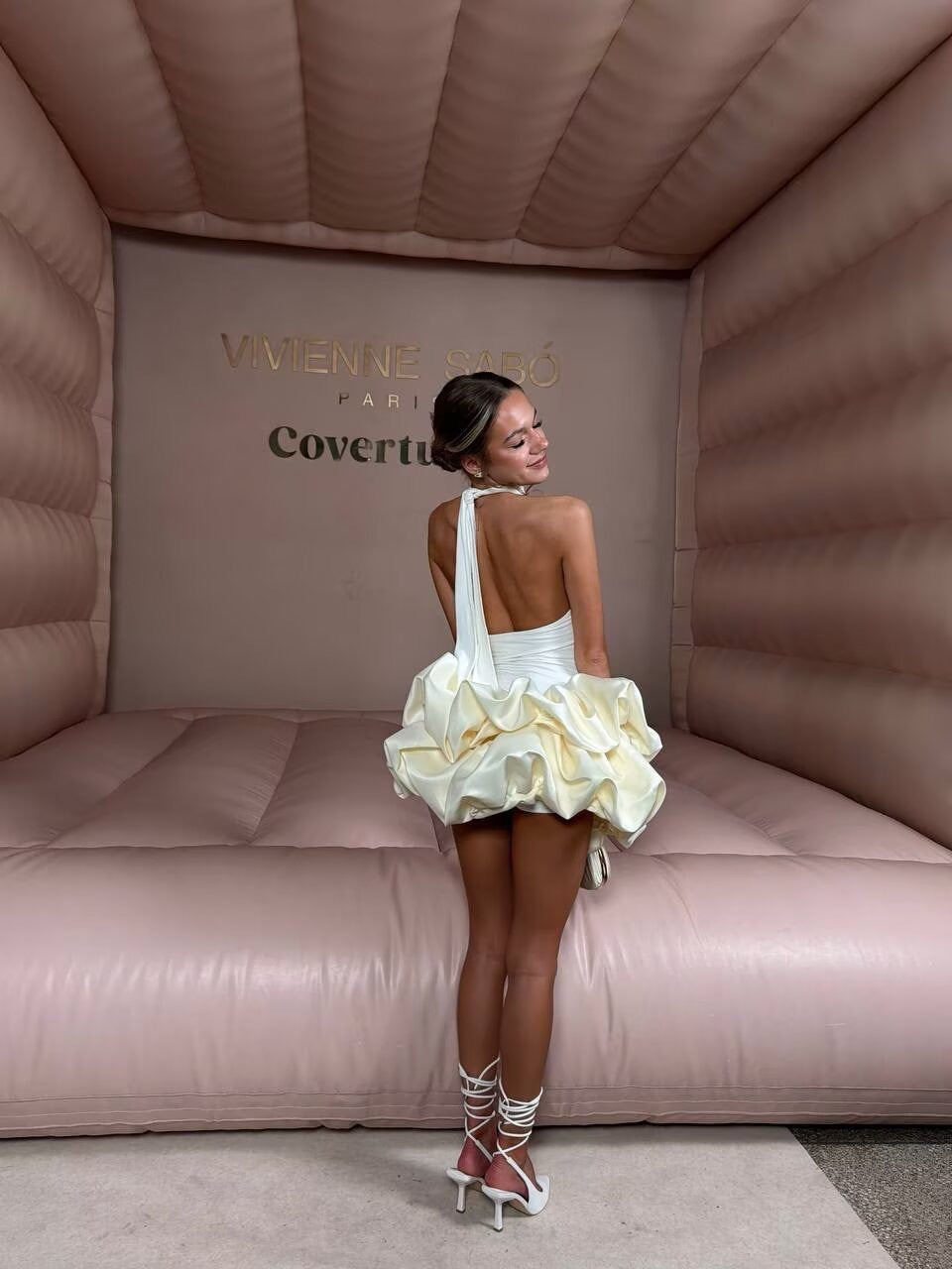 Tiered balloon mini dress with a turtleneck, neck ties, and an open back – DASSY