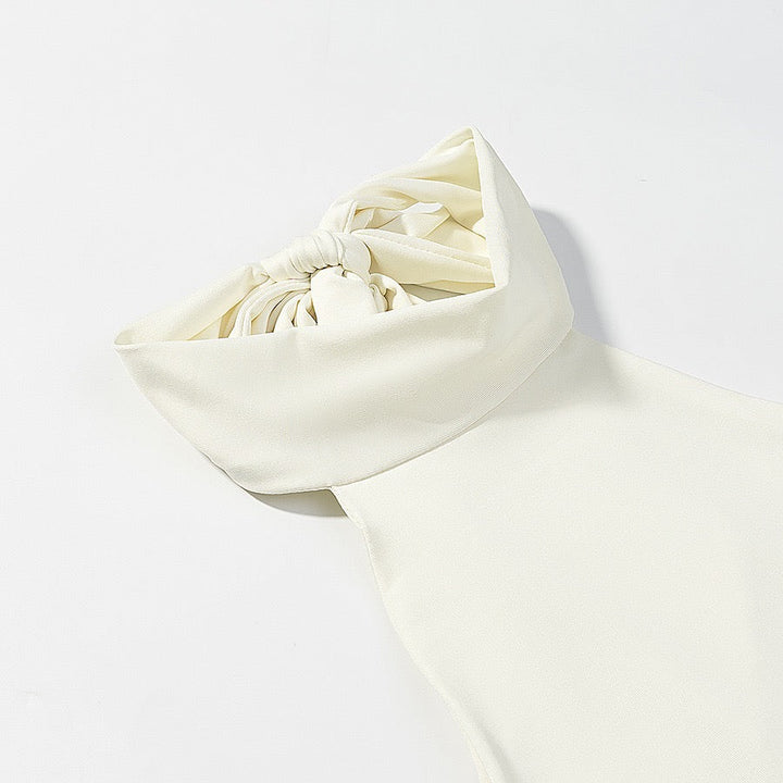 Tiered balloon mini dress with a turtleneck, neck ties, and an open back – DASSY