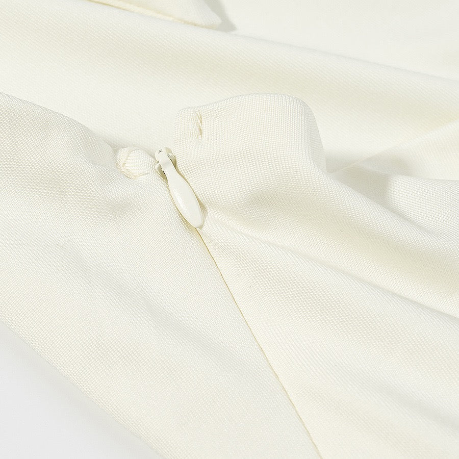 Tiered balloon mini dress with a turtleneck, neck ties, and an open back – DASSY